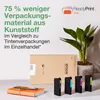 A marketing image showing a plant, a box, and ink cartridges on a desk, with text promoting reduced packaging. Náhled obrázku produktu