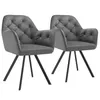 Two gray velvet armchairs with tufted backs and black metal legs are shown against a white background. Náhled obrázku produktu