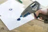 Pistola de pegamento caliente DREMEL® 930, con 12 barras de Vista previa de la imagen del producto 7
