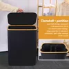 A person's hand is opening the lid of a dark gray laundry hamper with a wooden rim. The hamper has three internal compartments. A separate inset image shows a close-up of the top of the hamper with the compartments visible. Text overlays describe the produ Produktbild-Vorschau