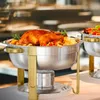 A chafing dish set with a roasted chicken and side dishes. Produktbild-Vorschau
