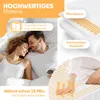 A couple lying in bed, with graphics illustrating the product's features. Produktbild-Vorschau