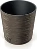 A close-up studio shot of a round, textured planter pot. Produktbild-Vorschau