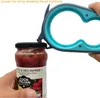 A hand holds a jar of pasta sauce while using a teal and gray multi-purpose jar opener to loosen the lid. Produktbild-Vorschau