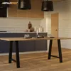 A modern kitchen with a wooden dining table and dark cabinets. Podgląd zdjęcia produktu