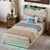 A bedroom scene featuring a bed with a tufted headboard, bedside table, lamp, and decorative items. Produktbild-Vorschau