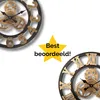 Two decorative wall clocks are shown, one partially visible on the left and another on the bottom right. A yellow star with text is placed between them. Produktbild-Vorschau