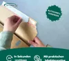 Hands closing a cardboard envelope with a self-adhesive strip. Produktbild-Vorschau