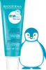 A tube of Bioderma ABCDerm Péri-oral cream is shown next to a cartoon penguin. Podgląd zdjęcia produktu