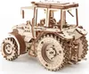 A wooden model tractor on a white background. Náhled obrázku produktu