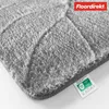 Close-up view of a grey bath mat with a textured pattern. Anteprima dell’immagine prodotto