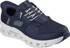 A close-up studio shot of a single blue Skechers Glide-Step Pro sports shoe. Voir les images du produit
