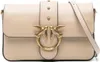 A close-up studio shot of a beige leather handbag with gold hardware. Podgląd zdjęcia produktu