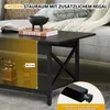 A black coffee table with a shelf is shown in a living room setting, with a couch and blanket in the background. A coffee grinder and a glass are on the shelf. Text overlays highlight features and dimensions. Náhľad obrázku produktu