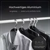 Several metal hangers holding shirts on a clothes rack, with promotional text about the product's quality. Produktbild-Vorschau