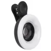 A close-up studio shot of a clip-on ring light for a phone camera. Produktbild-Vorschau