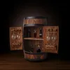 A wooden barrel-shaped bar cabinet with its doors open, displaying bottles and glasses. Produktbild-Vorschau