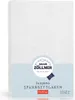 A white baby bed fitted sheet with brand and product information on the packaging. Produktbild-Vorschau