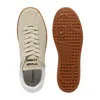 A top-down view of a pair of beige Lacoste sneakers, shown from the top and the sole. Produktbild-Vorschau