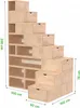 A wooden modular shelving unit designed to resemble stairs, with a mix of open shelves and drawers. Produktbild-Vorschau