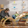 A father and baby are playing with a wooden climbing set indoors. Náhľad obrázku produktu