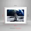 Gerahmtes Poster - Weißer Rahmen - Astronaut Mond Erde Raum Produktbild-Vorschau 5