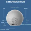 Diagram showing the back of a white alarm clock with labels pointing to various buttons and ports. Produktbild-Vorschau