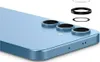 A close-up shot of the back of a light blue smartphone with three camera lenses visible. Several black rings and a clear glass circle are arranged above the phone, suggesting they are accessories for the camera lenses. Anteprima dell’immagine prodotto