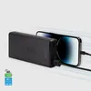 A black power bank is charging a smartphone. Náhľad obrázku produktu