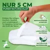 A hand is shown pressing down on a white mattress topper, with text overlays highlighting product features. Produktbild-Vorschau