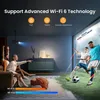 A living room scene with people watching a projector screen displaying a soccer game, with graphics indicating Wi-Fi 6 technology benefits. Náhled obrázku produktu