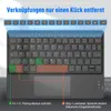 A close-up marketing image of a black wireless Bluetooth keyboard with a touchpad, highlighting specific key combinations for features. Produktbild-Vorschau