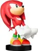 A figurine of the character Knuckles from Sonic the Hedgehog, standing on a black base. Podgląd zdjęcia produktu