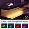A gaming desk with RGB lighting and a controller on top. Anteprima dell’immagine prodotto