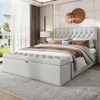 A bedroom scene featuring a bed with a tufted headboard and a storage bench at the foot of the bed. Voir les images du produit