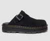 A black Dr. Martens clog shoe is shown against a light gray background. Produktbild-Vorschau