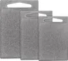 Three gray cutting boards of different sizes are arranged in a staggered formation against a white background. Anteprima dell’immagine prodotto