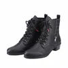 A pair of black lace-up boots with a side zipper and a patterned shaft insert. Voir les images du produit