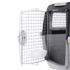 A close-up view of an open pet carrier with a wire door and a white food/water bowl attached. Podgląd zdjęcia produktu