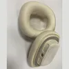 Close-up view of two white ear pads for headphones, likely for Apple AirPods Max. Podgląd zdjęcia produktu