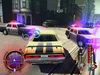 A car chase scene from a video game, with police cars pursuing a yellow car. Produktbild-Vorschau