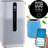 A product shot of an air purifier with accompanying marketing elements like a digital display, a filter, and a smartphone app interface. Náhled obrázku produktu