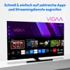 A television displaying a smart TV interface with various app logos and content recommendations. Produktbild-Vorschau