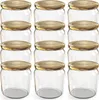 A studio shot of twelve empty glass jars with gold screw-on lids, arranged in four rows of three. Produktbild-Vorschau