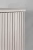 A close-up view of the fluted front of a beige cabinet. Produktbild-Vorschau