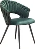 A green velvet chair with a braided back and black legs, isolated on a white background.