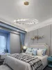 A bedroom with a bed, nightstand, and a window with curtains. Anteprima dell’immagine prodotto