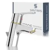 A chrome and gold faucet is shown in front of its packaging. Produktbild-Vorschau