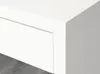 A close-up view of the corner of a white desk with a drawer. Produktbild-Vorschau