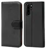 A black flip case for a smartphone, shown from the front and back. Náhľad obrázku produktu